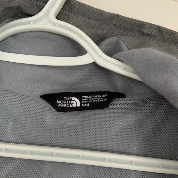 Barely used, grey North Face rain jacket. Hood folds in. - Picture 3 of 4